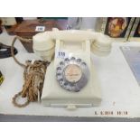 A 1930/40s ivory Bakelite telephone in fine condition