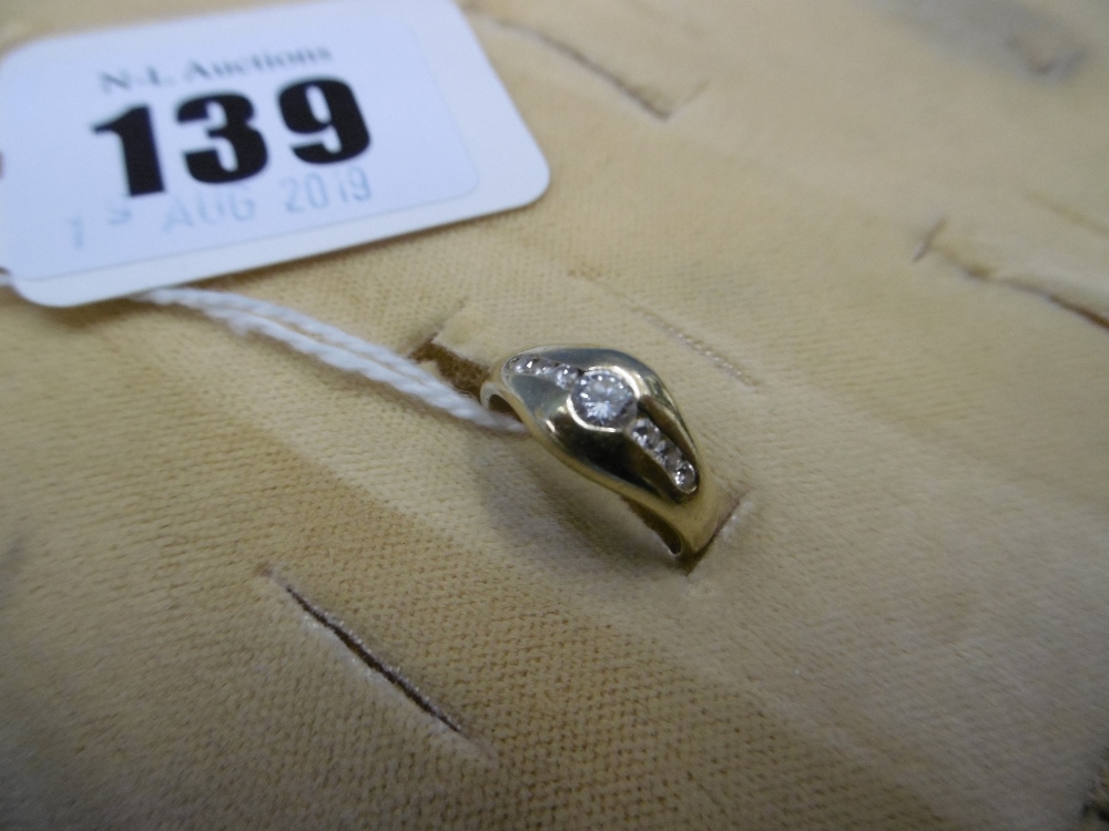 A small 18ct yellow gold diamond set ring