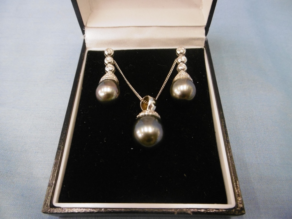 A pair Tahitian pearl and diamond drop earrings and matching necklace set in 18ct gold, 1.5ct. - Image 3 of 4