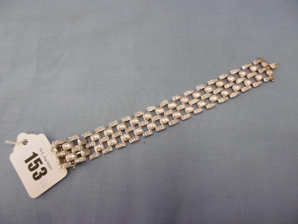 A white metal and diamond set bracelet marked 925