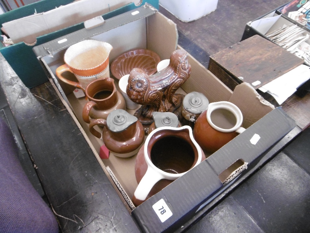 an assortment of earthenware inc. jelly moulds etc.