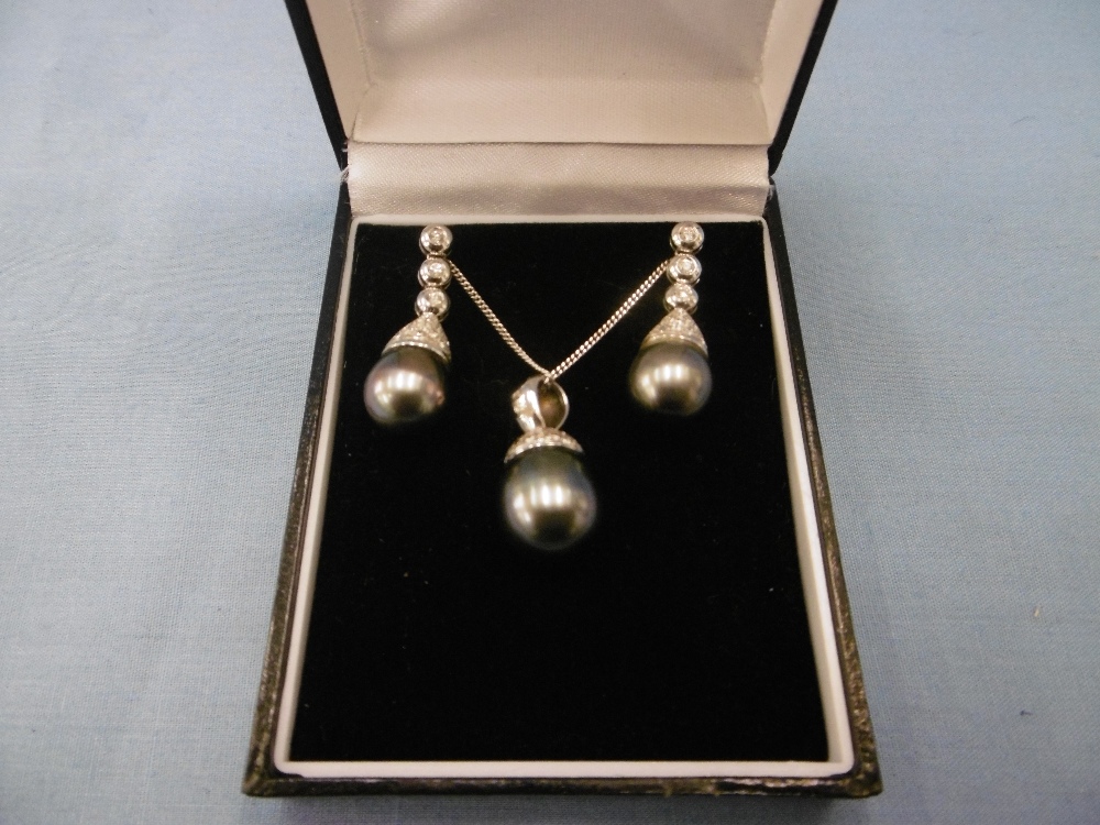 A pair Tahitian pearl and diamond drop earrings and matching necklace set in 18ct gold, 1.5ct. - Image 4 of 4