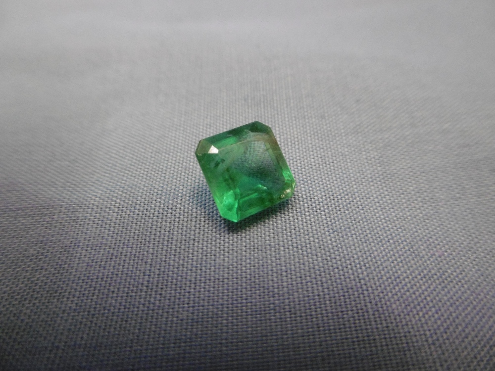 A single loose emerald stone, 1.