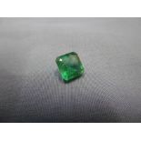 A single loose emerald stone, 1.