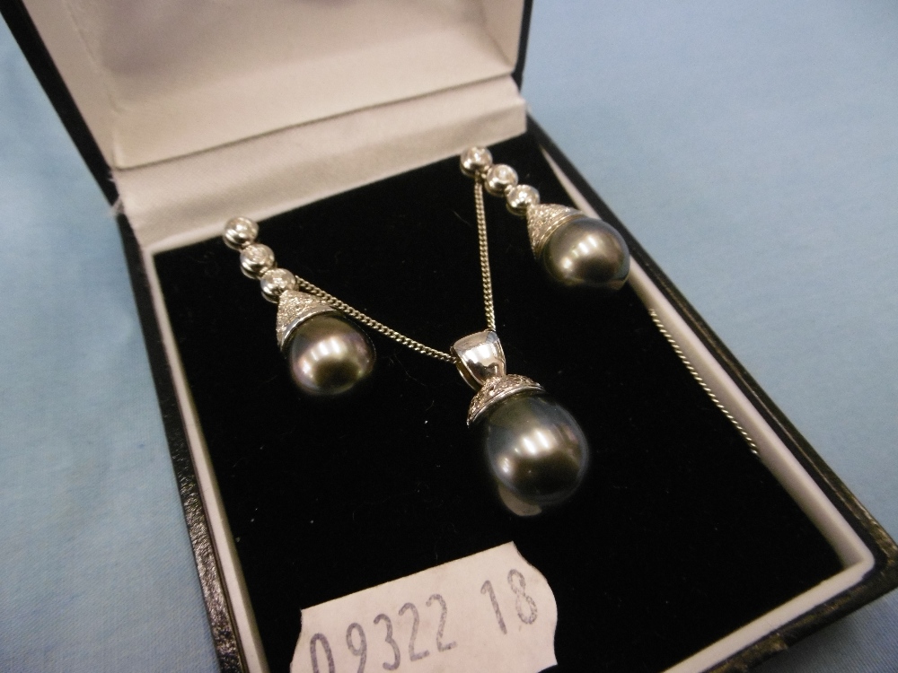 A pair Tahitian pearl and diamond drop earrings and matching necklace set in 18ct gold, 1.5ct. - Image 2 of 4