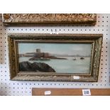 A framed Edwardian oil on board coastal scene with fort signed and dated