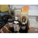 Ten assorted bottles of drink including a bottle of Veuve Cliquet champagne, Ballentines whisky,