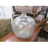 A large carboy plus eastern brass tray