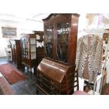 A mahogany bureau bookcase