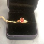 A 9ct white gold & ruby ring size N