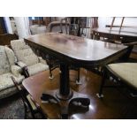 A 19th century rosewood fold over card table