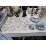 A Doulton part dinner set and Thomas part tea set