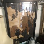 A framed wood cut silhouette picture