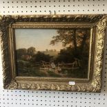 A gilt framed oil on canvas pastoral landscape with windmill and figures