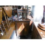 A 19th century rosewood corner cabinet