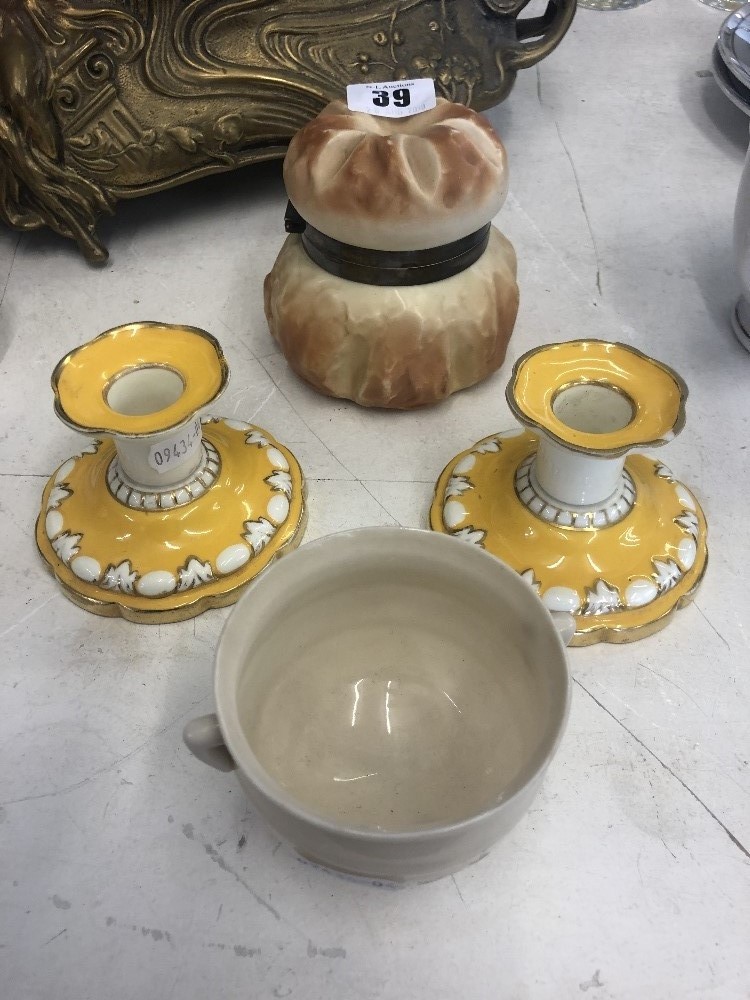 A Royal Worcester pot A Belleek sugar bowl and a pair of Tuscan candlesticks