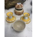 A Royal Worcester pot A Belleek sugar bowl and a pair of Tuscan candlesticks