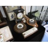 A small quantity of clocks and barometers