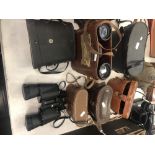 Seven pairs of binoculars