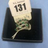 A 14ct white gold diamond and emerald ring size O weight 13.