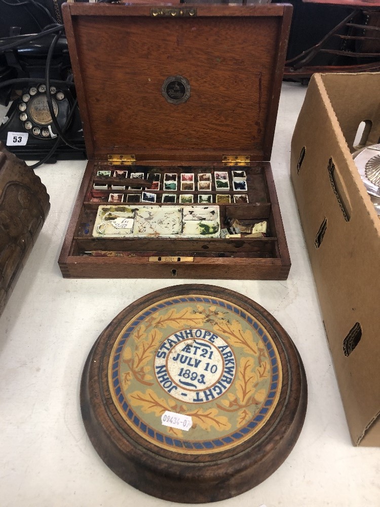 A 19th century tea pot stand and an artists set