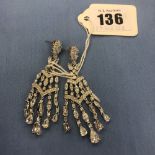A pair of art deco style silver drop chandelier earrings