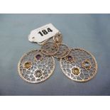 A pair of gemstone set 14ct gold earrings