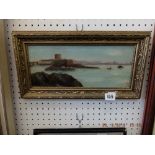 A framed Edwardian oil on board coastal scene with fort signed and dated