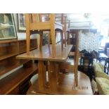 An arts and crafts style refectory table and four chairs by Reynolds of Ludlow after Charles Rennie