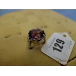 An 18ct gold amethyst and diamond ring,