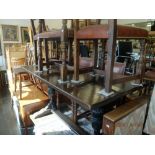 An oak refectory table and five chairs