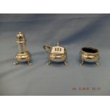 A three piece hallmarked silver cruet set