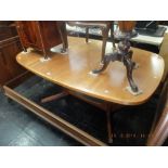 A Teak retro extending dining table with two leaves