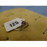 A 9ct white gold & ruby ring size N