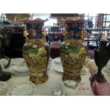 A pair of Chinese temple vases,