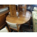 A retro Dyrland table with two leaves and six chairs