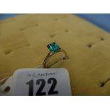 An 18ct gold, diamond and emerald ring,