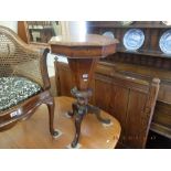 A 19th century inlaid trumpet games table and mahogany night stand