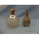 A hallmarked silver topped scent bottle plus one other