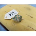 A 14ct white gold diamond and emerald ring size o weight 13.