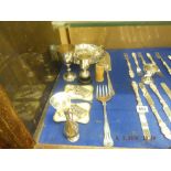 A mixed assortment of small items including silverware and Limoges porcelain