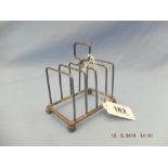 A hallmarked silver toast rack