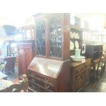 A mahogany bureau bookcase