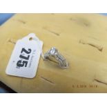 An 18ct, emerald cut diamond single stone ring, VVS1, size L,