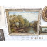 A gilt framed oil on canvas river scene