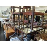An oak refectory table and five chairs