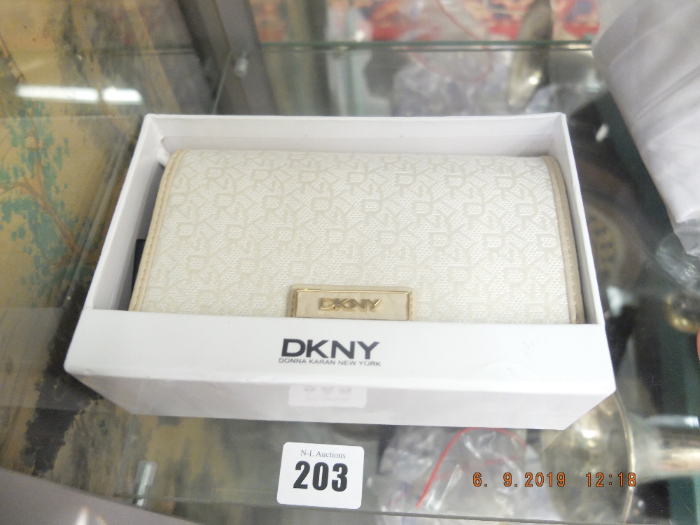 A DKNY purse- Hemp-sand, code 264, brand new unused, still has labels etc.