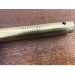 An Edwardian cylindrical brass short staff stamped " C.R Spice. Warder R.N HMS.