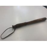 A late Victorian turned ash truncheon, stamped "Dundee Police",