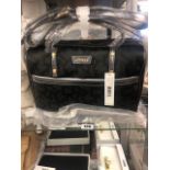 A DKNY black and gun metal handbag, brand new unused, still has labels etc.
